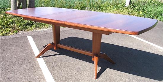 A Gordon Russell Burford Extending Dining Table and Eight Matching Chairs,